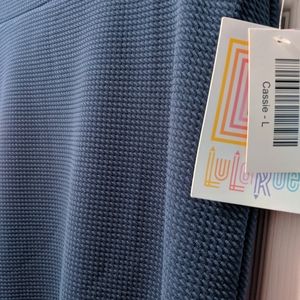 Solid blue Cassie skirt by Lularoe. Sz L NWT